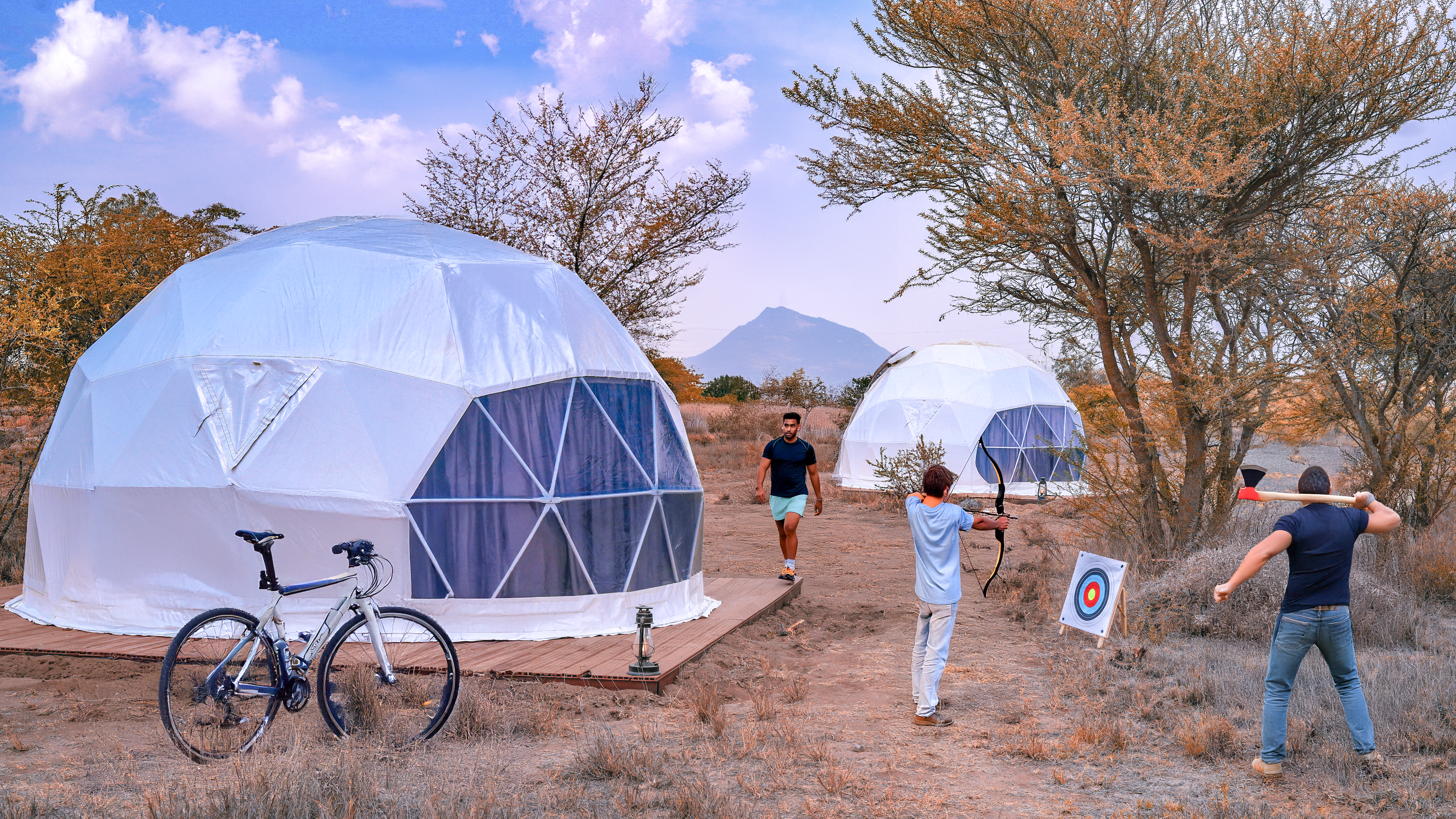 Family adventure with geodesic domes in Saudi Arabia desert landscape